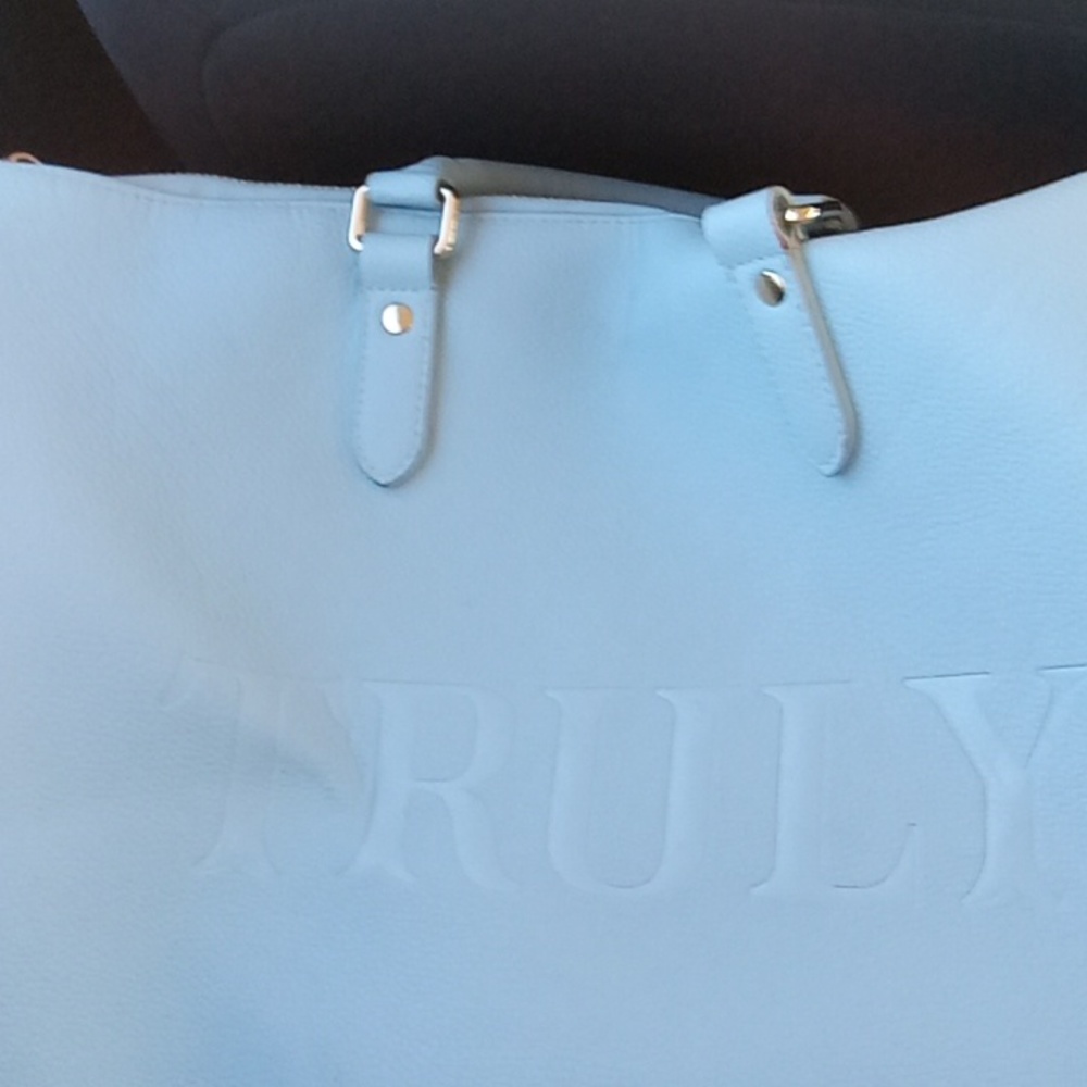 Truly baby blue leather mini duffel bag